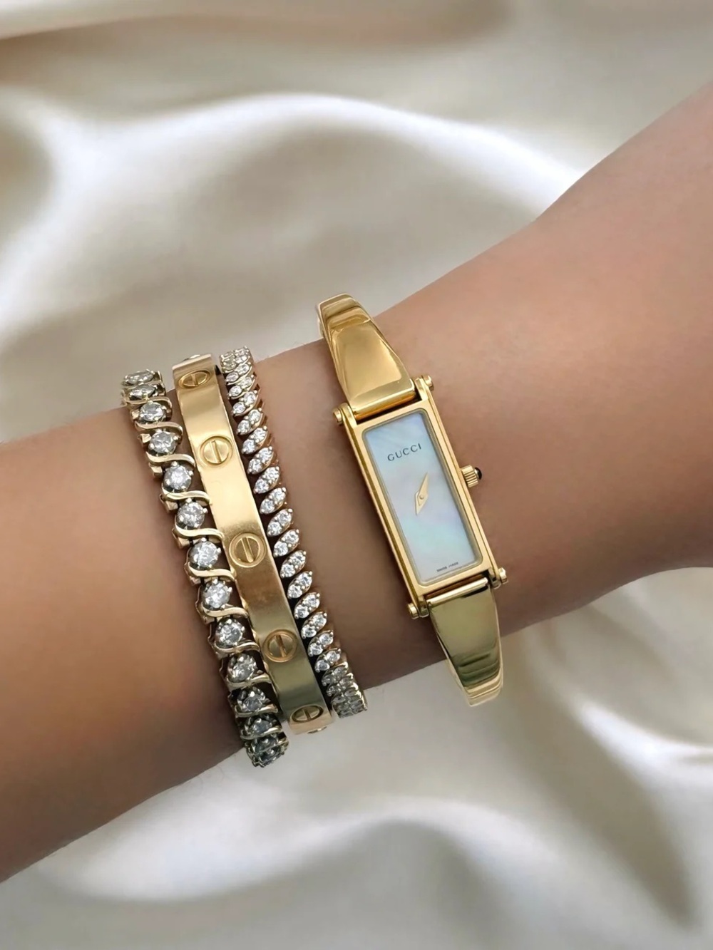 AUTHENTIC VINTAGE GUCCI MOTHER-OF-PEARL DAINTY GOLD WATCH